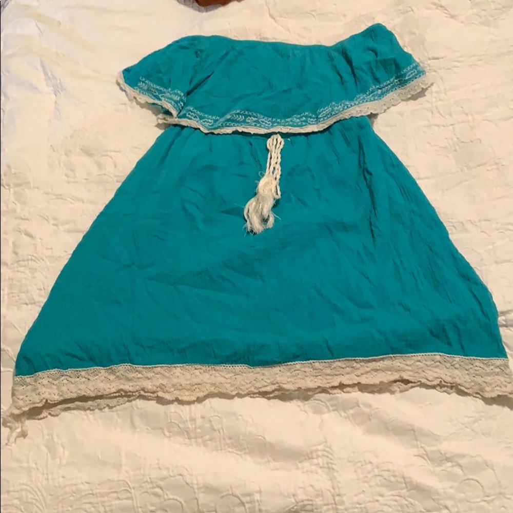 Strapless teal dress with flowy top